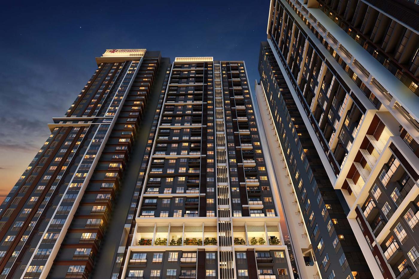 Looking-up dusk view of the Binastra Cochrane residential tower facade with planter balconies (artist's impression)