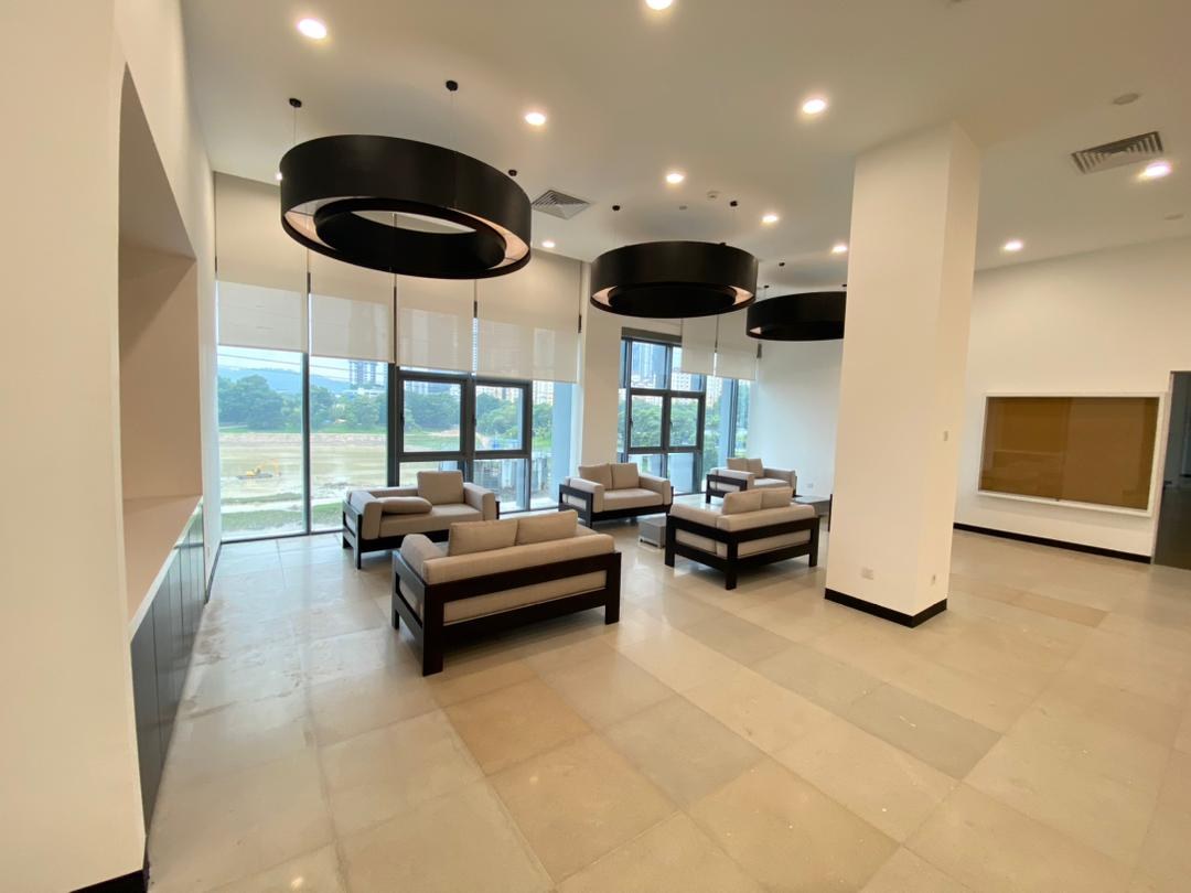Residents lounge with day beds and full-height glazing