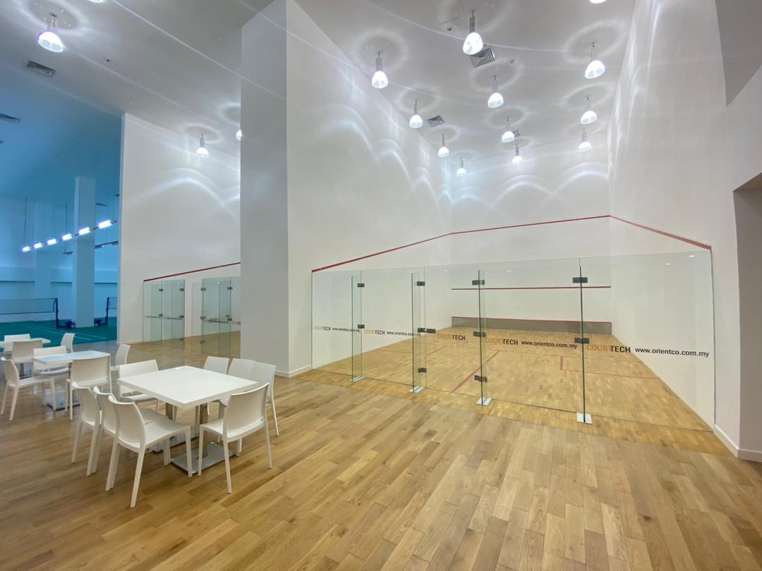 Squash court with a glass back wall